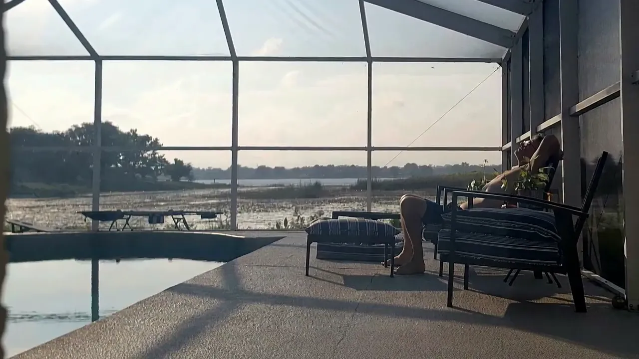Lakeside screened porch at golden hour